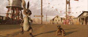 A scene from "Desert Racers" featuring diverse characters racing in a vibrant desert landscape with sand dunes