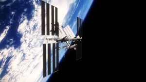 3D illustration of a spacecraft orbiting Earth, showcasing the planet's curvature and atmosphere in the background.